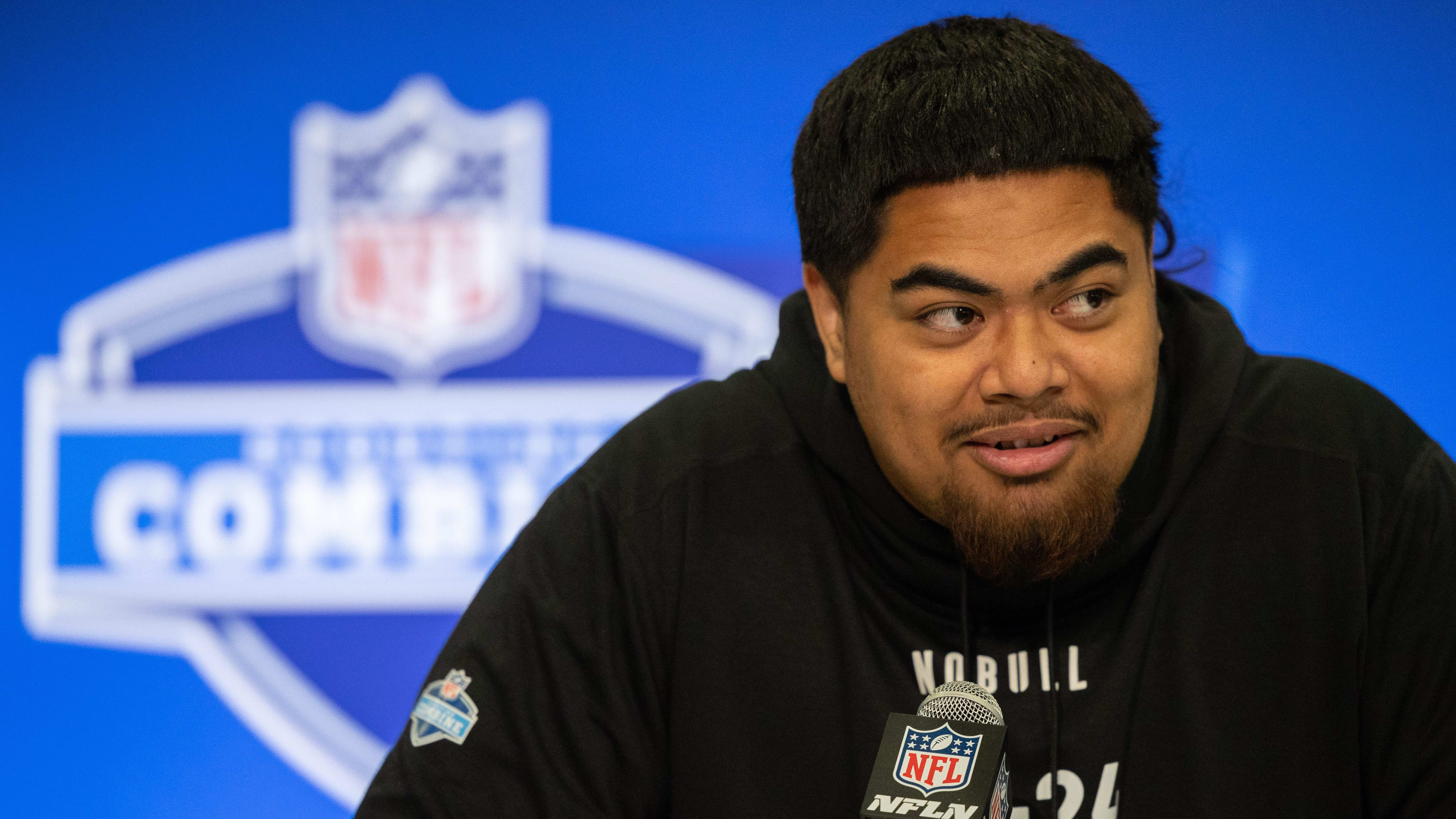 Oregon State offensive lineman Taliese Fuaga talks to the media during the NFL Combine.