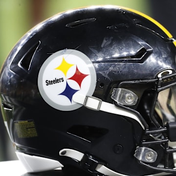 Aug 9, 2024; Pittsburgh, Pennsylvania, USA;  A Pittsburgh Steelers helmet sits on an equipment trunk during the game against the Houston Texans during the fourth quarter at Acrisure Stadium. Mandatory Credit: Charles LeClaire-Imagn Images