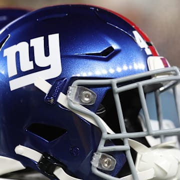 New York Giants helmets on the sidelines against the Pittsburgh Steelers during the third quarter at Acrisure Stadium.  