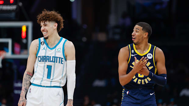Charlotte Hornets Gusto Lamelo Ball (1) and Indiana Pacers Guard Tyrese Haliburton Laughter