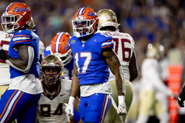 Florida Gators linebacker Scooby Williams (17) celebrates a stop during the first half against the Florida State Seminoles. 