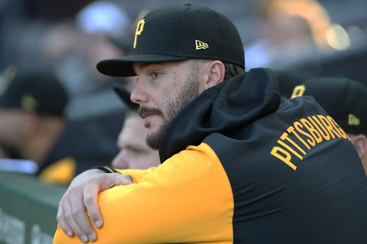 ittsburgh Pirates pitcher Paul Skenes looks on from the dugout against the Washington Nationals.