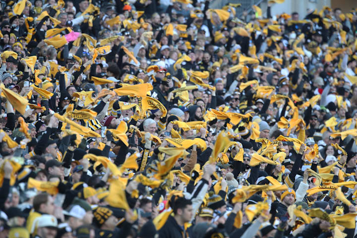 Pittsburgh Steelers fans wave Terrible Towels against the Cleveland Browns during the fourth quarter at Acrisure Stadium. 