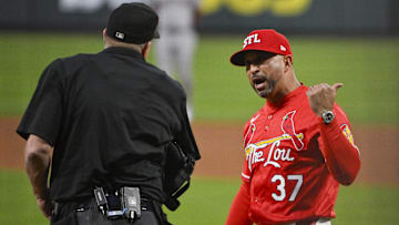 May 23, 2025; St. Louis, Missouri, USA;  St. Louis Cardinals manager Oliver Marmol (37) reacts after he was ejected from the game by umpire Ron Kulpa (46) during the fourth inning against the Arizona Diamondbacks at Busch Stadium. Mandatory Credit: Jeff Curry-Imagn Images