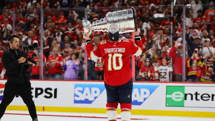 Jun 24, 2024; Sunrise, Florida, USA; Florida Panthers right wing Vladimir Tarasenko (10) kisses the cup after winning game seven of the 2024 Stanley Cup Final against the Edmonton Oilers at Amerant Bank Arena. Mandatory Credit: Sam Navarro-USA TODAY Sports
