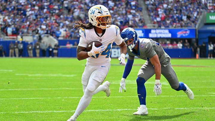Sep 27, 2026; Orchard Park, New York, USA;  Los Angeles Chargers running back Keaton Mitchell (34) scores a touchdown in the first quarter against the Buffalo Bills at New Highmark Stadium.  Mandatory Credit: Mark Konezny-Imagn Images