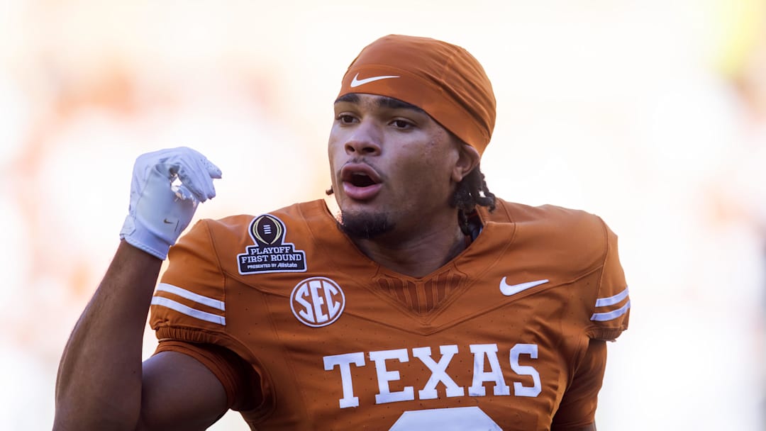 Dec 21, 2024; Austin, Texas, USA; Texas Longhorns wide receiver DeAndre Moore Jr. (0) against the Clemson Tigers during the CFP National playoff first round at Darrell K Royal-Texas Memorial Stadium.
