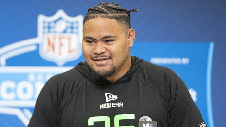 Miami Dolphins offensive lineman Jonah Savaiinaea