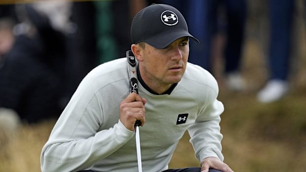 Jordan Spieth lines up his putt on the 12th green during the final round of the 2024 British Open.