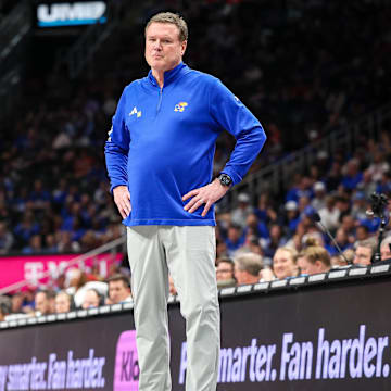 Mar 13, 2025; Kansas City, MO, USA; Kansas Jayhawks coach Bill Self watches game play during the first half against the Arizona Wildcats at T-Mobile Center. Mandatory Credit: William Purnell-Imagn Images