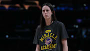Aug 5, 2025; Los Angeles, California, USA; Indiana Fever guard Caitlin Clark (22) watches pregame warmups against the LA Sparks at Crypto.com Arena. Mandatory Credit: Kirby Lee-Imagn Images