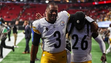 Sep 8, 2024; Atlanta, Georgia, USA; Pittsburgh Steelers quarterback Russell Wilson (3) and cornerback Donte Jackson (26) celebrate after a victory over the Atlanta Falcons at Mercedes-Benz Stadium. Mandatory Credit: Brett Davis-Imagn Images