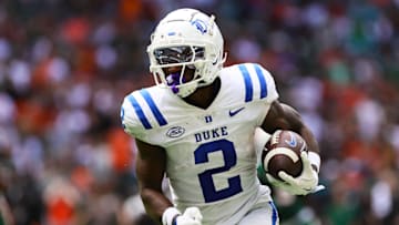 Nov 2, 2024; Miami Gardens, Florida, USA; Duke Blue Devils wide receiver Sahmir Hagans (2) runs with the football for a touchdown against the Miami Hurricanes.