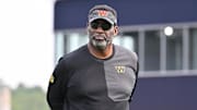 Aug 6, 2025; Foxborough, MA, USA; Washington Commanders senior advisor Doug Williams watches over practice at training camp at Gillette Stadium. Mandatory Credit: Eric Canha-Imagn Images