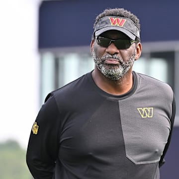 Aug 6, 2025; Foxborough, MA, USA; Washington Commanders senior advisor Doug Williams watches over practice at training camp at Gillette Stadium. Mandatory Credit: Eric Canha-Imagn Images