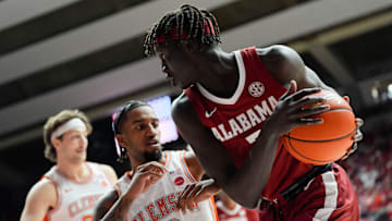Dec 3, 2025; Tuscaloosa, AL, USA; Alabama forward Taylor Bol Bowen (7) looks for a way around Clemson guard Dillon Hunter (2) at Coleman Coliseum. Mandatory Credit: Gary Cosby Jr.-Tuscaloosa News