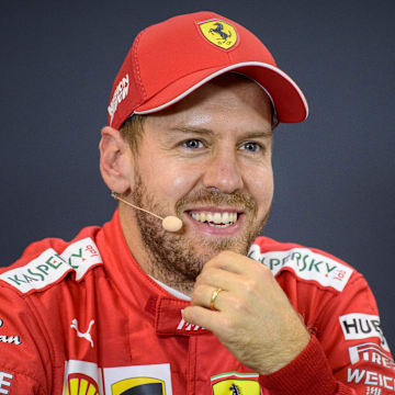 Nov 2, 2019; Austin, TX, USA; Scuderia Ferrari Mission Winnow driver Sebastian Vettel (5) of Germany speaks to the media after qualifying for the United States Grand Prix at Circuit of the Americas. Mandatory Credit: Jerome Miron-Imagn Images