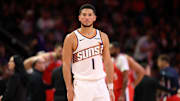 Nov 6, 2025; Phoenix, Arizona, USA; Phoenix Suns guard Devin Booker (1) against the Los Angeles Clippers in the second half at the Mortgage Matchup Center. Mandatory Credit: Mark J. Rebilas-Imagn Images

