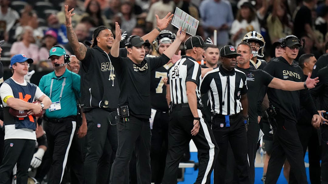 Oct 5, 2025; New Orleans, Louisiana, USA; New Orleans Saints head coach Kellen Moore signals from the sideline against the New York Giants during the fourth quarter at Caesars Superdome. Mandatory Credit: Matthew Hinton-Imagn Images