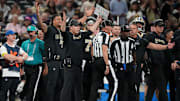 Oct 5, 2025; New Orleans, Louisiana, USA; New Orleans Saints head coach Kellen Moore signals from the sideline against the New York Giants during the fourth quarter at Caesars Superdome. Mandatory Credit: Matthew Hinton-Imagn Images