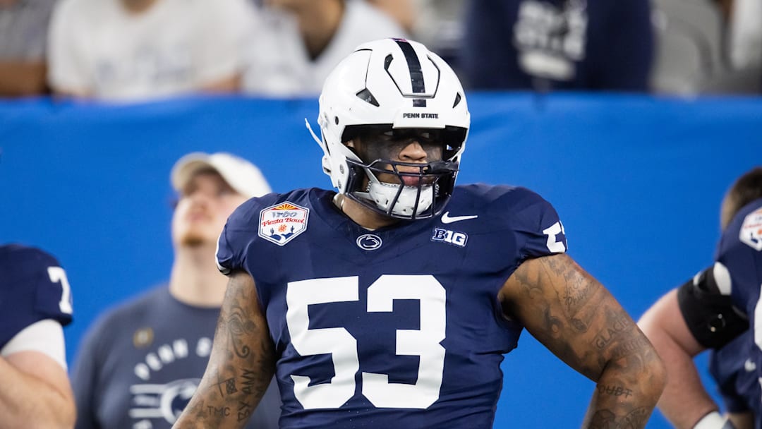 Dec 31, 2024; Glendale, AZ, USA; Penn State Nittany Lions offensive lineman Nick Dawkins (53) against the Boise State Broncos during the Fiesta Bowl at State Farm Stadium. Mandatory Credit: Mark J. Rebilas-Imagn Images