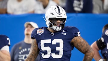 Dec 31, 2024; Glendale, AZ, USA; Penn State Nittany Lions offensive lineman Nick Dawkins (53) against the Boise State Broncos during the Fiesta Bowl at State Farm Stadium. Mandatory Credit: Mark J. Rebilas-Imagn Images
