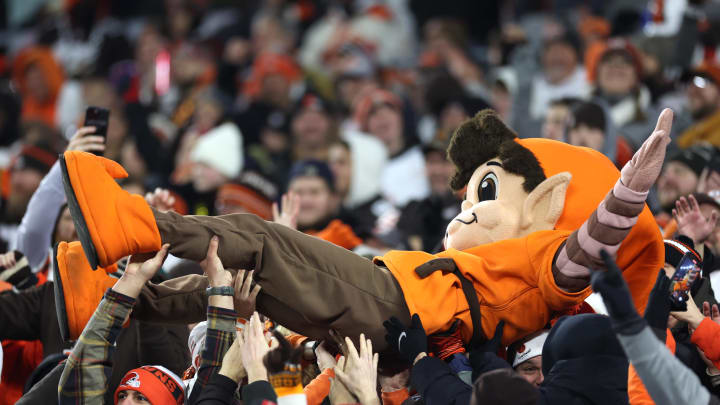 Dec 28, 2023; Cleveland, Ohio, USA; Cleveland Browns mascot Brownie the Elf is carried by fans in the stands during the second half against the New York Jets at Cleveland Browns Stadium. Mandatory Credit: Scott Galvin-USA TODAY Sports