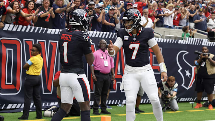 Houston Texans quarterback C.J. Stroud celebrates with wide receiver Stefon Diggs 