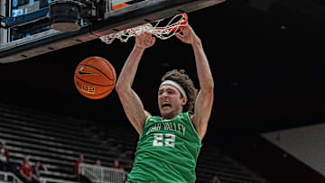 Dec 3, 2024; Stanford, California, USA; Utah Valley Wolverines forward Carter Welling (22) dunks the basketball against the Stanford Cardinal during the second half at Maples Pavilion. Mandatory Credit: Neville E. Guard-Imagn Images