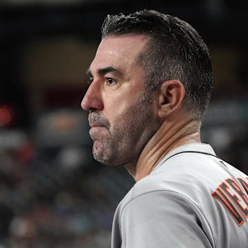 San Francisco Giants pitcher Justin Verlander (35) watches from the dugout after pitching 7 innings against the Arizona Diamondbacks at Chase Field. 