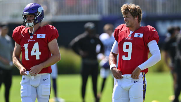 Aug 2, 2024; Eagan, MN, USA; Minnesota Vikings quarterback J.J. McCarthy (9) and quarterback Sam Darnold (14) warm up