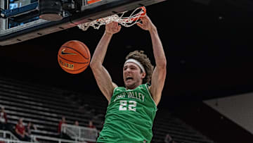 Dec 3, 2024; Stanford, California, USA; Utah Valley Wolverines forward Carter Welling (22) dunks the basketball against the Stanford Cardinal during the second half at Maples Pavilion