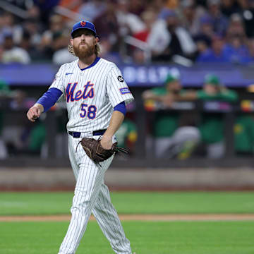 Aug 13, 2024; New York City, New York, USA; New York Mets starting pitcher Paul Blackburn (58) reacts during the fourth inning against the Oakland Athletics at Citi Field. Mandatory Credit: Brad Penner-Imagn Images