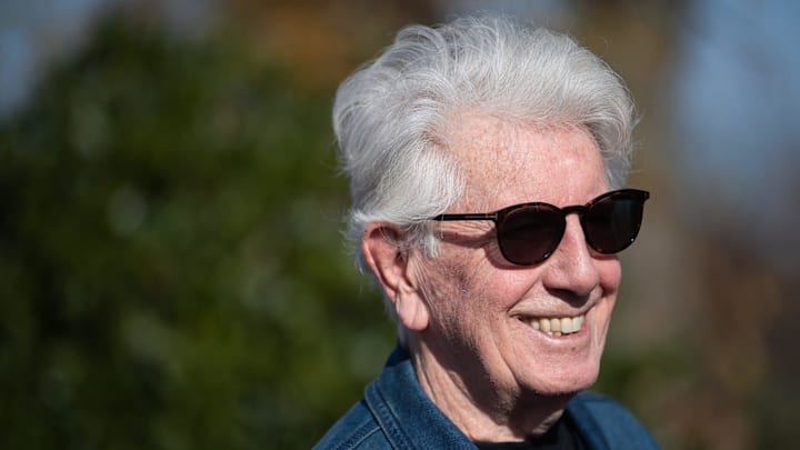Graham Nash smiles as he meets people