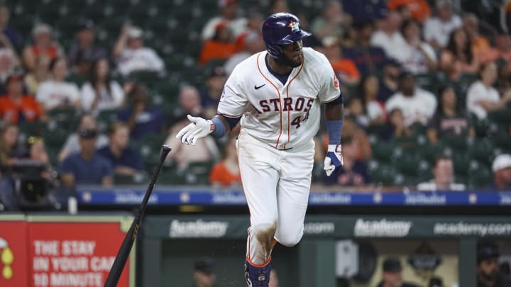 Jul 10, 2024; Houston, Texas, USA; Houston Astros designated hitter Yordan Alvarez (44) hits an RBI single during the second inning against the Miami Marlins at Minute Maid Park. Mandatory Credit: Troy Taormina-USA TODAY Sports