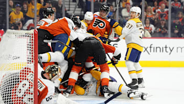 Mar 31, 2025; Philadelphia, Pennsylvania, USA; The Philadelphia Flyers and the Nashville Predators fight in the third period at Wells Fargo Center. Mandatory Credit: Kyle Ross-Imagn Images