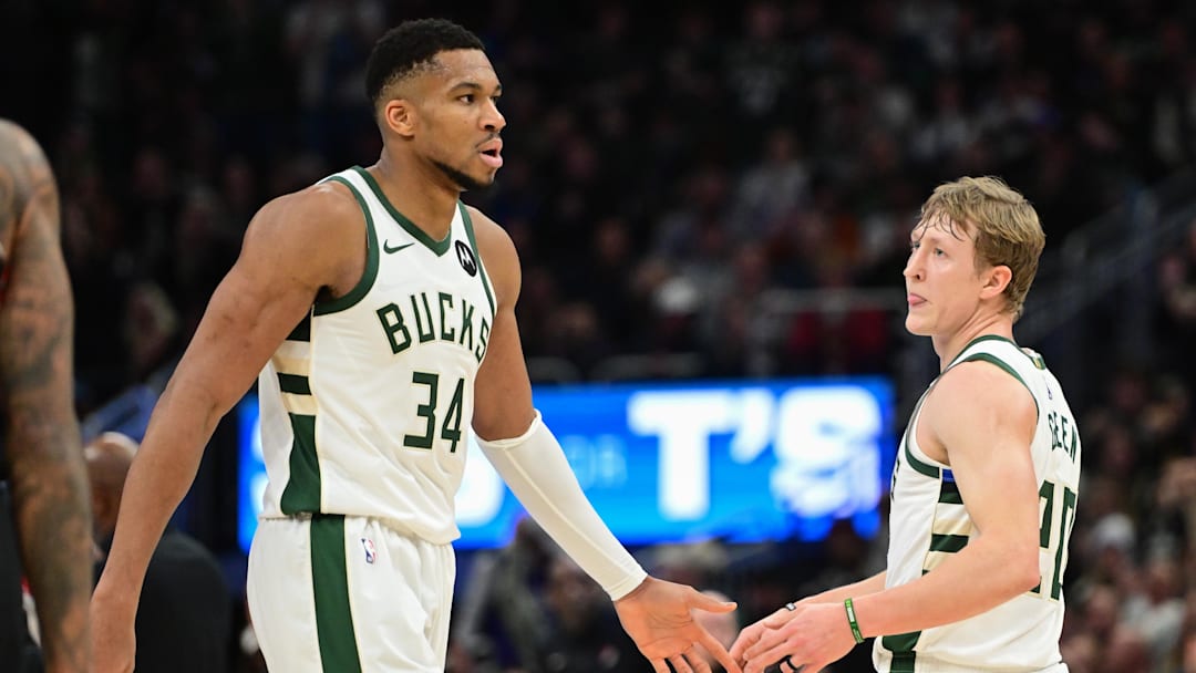 Jan 4, 2025; Milwaukee, Wisconsin, USA;  Milwaukee Bucks forward Giannis Antetokounmpo (34) and guard AJ Green (20) reacts in the fourth quarter against the Portland Trail Blazers at Fiserv Forum. 