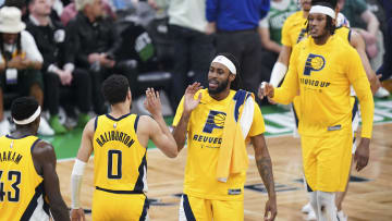 May 21, 2024; Boston, Massachusetts, USA; Indiana Pacers guard Tyrese Haliburton (0) and teammates react after his three point basket against the Boston Celtics in the third quarter during game one of the eastern conference finals for the 2024 NBA playoffs at TD Garden. Mandatory Credit: David Butler II-USA TODAY Sports