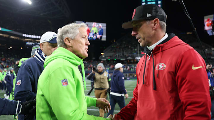 San Francisco 49ers head coach Kyle Shanahan (R) and Seattle Seahawks head coach Pete Carroll (L)