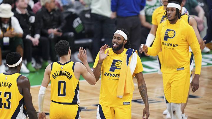 May 21, 2024; Boston, Massachusetts, USA; Indiana Pacers guard Tyrese Haliburton (0) and teammates react after his three point basket against the Boston Celtics in the third quarter during game one of the eastern conference finals for the 2024 NBA playoffs at TD Garden. Mandatory Credit: David Butler II-USA TODAY Sports