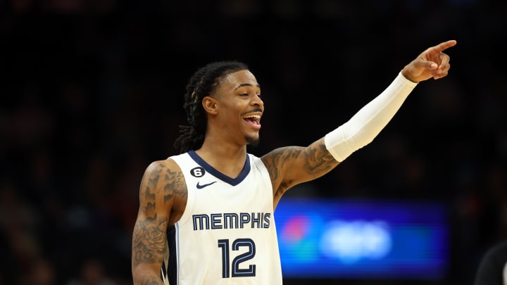 Dec 23, 2022; Phoenix, Arizona, USA; Memphis Grizzlies guard Ja Morant (12) reacts against the Phoenix Suns at Footprint Center. Mandatory Credit: Mark J. Rebilas-USA TODAY Sports