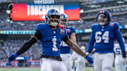New York Giants wide receiver Malik Nabers (1) celebrates with his teammates after scoring a touchdown during a game between New York Giants and Indianapolis Colts at MetLife Stadium on Sunday, Dec. 29, 2024.