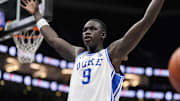 Mar 15, 2025; Charlotte, NC, USA; Duke Blue Devils center Khaman Maluach (9) reacts after a play in the first half of the 2025 ACC Conference Championship game against the Louisville Cardinals at Spectrum Center. Mandatory Credit: Jim Dedmon-Imagn Images