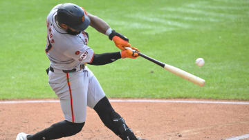 Jul 6, 2024; Cleveland, Ohio, USA; San Francisco Giants center fielder Heliot Ramos (17) singles in the fifth inning against the Cleveland Guardians at Progressive Field