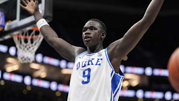 Mar 15, 2025; Charlotte, NC, USA; Duke Blue Devils center Khaman Maluach (9) reacts after a play in the first half of the 2025 ACC Conference Championship game against the Louisville Cardinals at Spectrum Center. Mandatory Credit: Jim Dedmon-Imagn Images