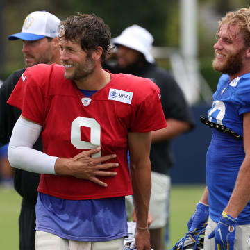 Aug 1, 2024; Los Angeles, CA, USA;  Los Angeles Rams quarterback Matthew Stafford (9) and wide receiver Cooper Kupp (10) and wide receiver Puka Nacua (17) smile during training camp at Loyola Marymount University. Mandatory Credit: Kiyoshi Mio-USA TODAY Sports