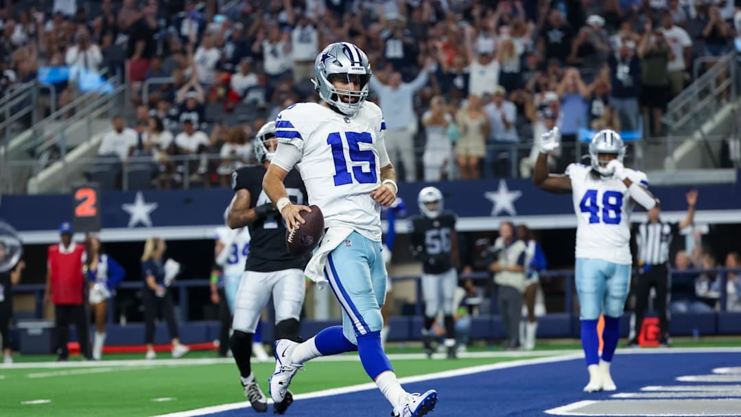 Aug 26, 2023; Arlington, Texas, USA;  Dallas Cowboys quarterback Will Grier (15) runs for a touchdown  during the second half against the Las Vegas Raiders at AT&T Stadium. Mandatory Credit: Kevin Jairaj-Imagn Images