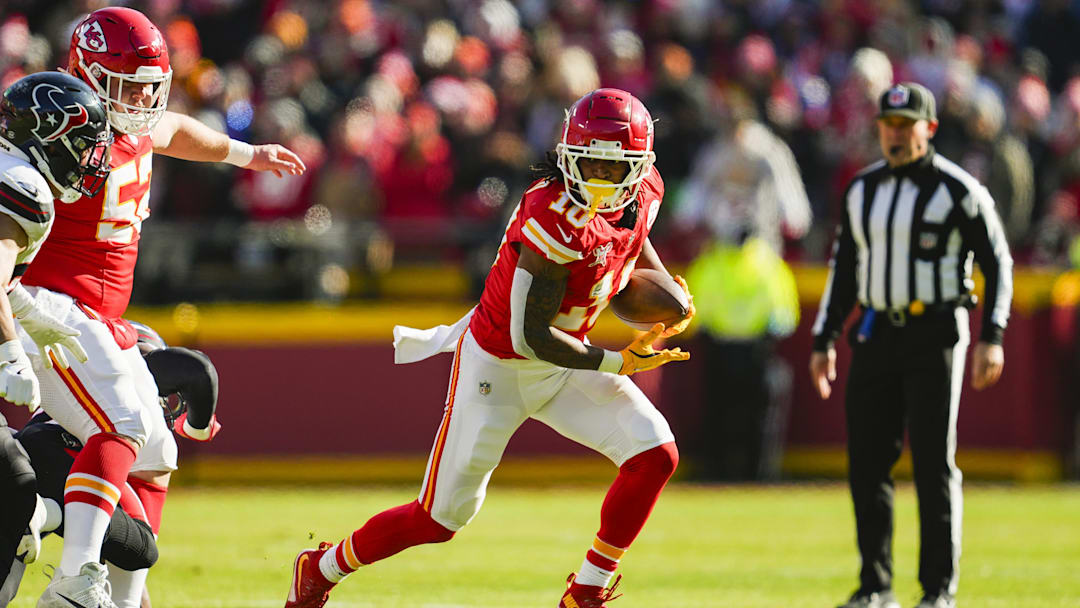 Dec 21, 2024; Kansas City, Missouri, USA; Kansas City Chiefs running back Isiah Pacheco (10) runs the ball during the first half against the Houston Texans at GEHA Field at Arrowhead Stadium. Mandatory Credit: Jay Biggerstaff-Imagn Images
