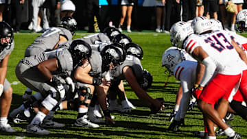 Nov 11, 2023; Boulder, Colorado, USA; Colorado Buffaloes and Arizona Wildcats line up from each other in the third quarter at Folsom Field. Mandatory Credit: Ron Chenoy-Imagn Images