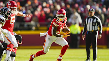 Dec 21, 2024; Kansas City, Missouri, USA; Kansas City Chiefs running back Isiah Pacheco (10) runs the ball during the first half against the Houston Texans at GEHA Field at Arrowhead Stadium. Mandatory Credit: Jay Biggerstaff-Imagn Images